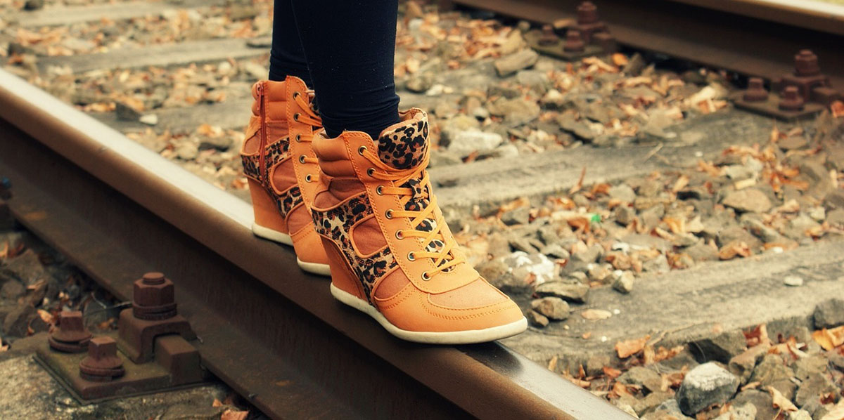 image of woman's boots walking on train track for blog post on borderline personality disorder connolly centre